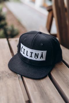 A cap ČILIŅĀ